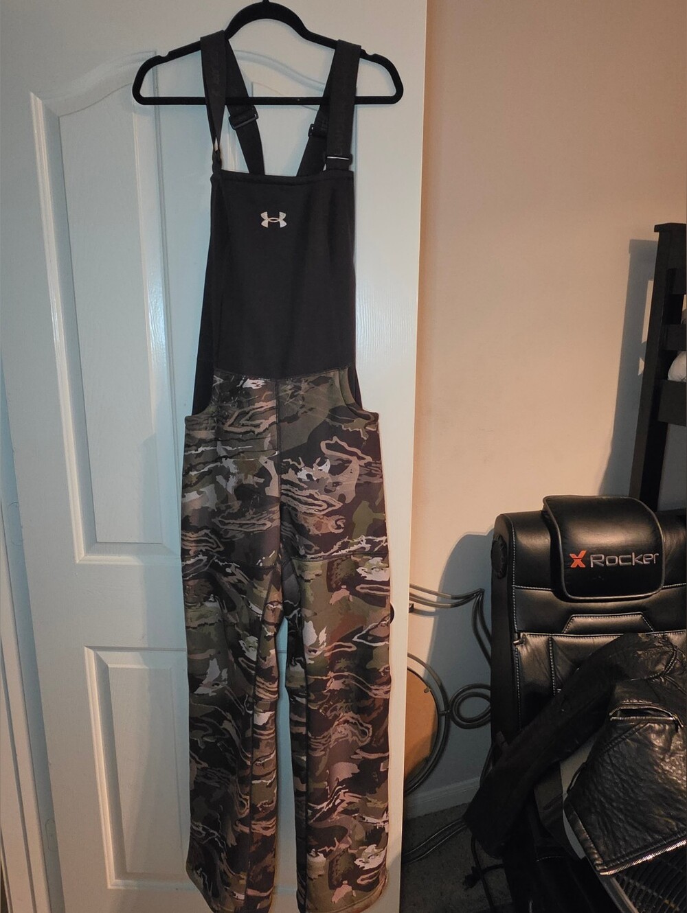 Under Armour Hunting Women’s Bib Jumpsuit in Black and Camo